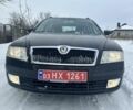 Черный Шкода Октавия, объемом двигателя 1.6 л и пробегом 229 тыс. км за 5750 $, фото 1 на Automoto.ua