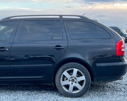 Чорний Шкода Октавія, об'ємом двигуна 2 л та пробігом 307 тис. км за 6990 $, фото 5 на Automoto.ua