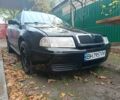 Черный Шкода Октавия, объемом двигателя 1.6 л и пробегом 220 тыс. км за 4000 $, фото 1 на Automoto.ua