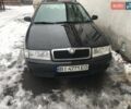 Черный Шкода Октавия, объемом двигателя 1.6 л и пробегом 245 тыс. км за 5900 $, фото 1 на Automoto.ua