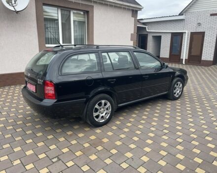 Черный Шкода Октавия, объемом двигателя 1.6 л и пробегом 201 тыс. км за 5900 $, фото 3 на Automoto.ua
