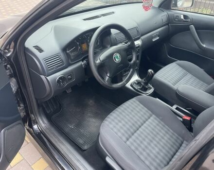 Черный Шкода Октавия, объемом двигателя 1.6 л и пробегом 201 тыс. км за 5900 $, фото 6 на Automoto.ua