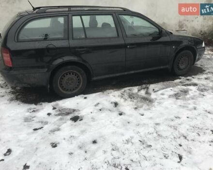 Черный Шкода Октавия, объемом двигателя 1.6 л и пробегом 245 тыс. км за 5900 $, фото 1 на Automoto.ua