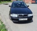 Черный Шкода Октавия, объемом двигателя 1.6 л и пробегом 233 тыс. км за 5800 $, фото 1 на Automoto.ua