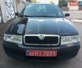 Черный Шкода Октавия, объемом двигателя 1.6 л и пробегом 215 тыс. км за 6350 $, фото 1 на Automoto.ua