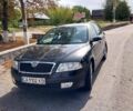 Чорний Шкода Октавія, об'ємом двигуна 1.6 л та пробігом 261 тис. км за 7125 $, фото 1 на Automoto.ua