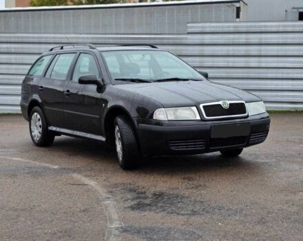 Черный Шкода Октавия, объемом двигателя 1.6 л и пробегом 238 тыс. км за 5500 $, фото 1 на Automoto.ua