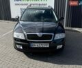 Черный Шкода Октавия, объемом двигателя 1.6 л и пробегом 214 тыс. км за 5900 $, фото 1 на Automoto.ua
