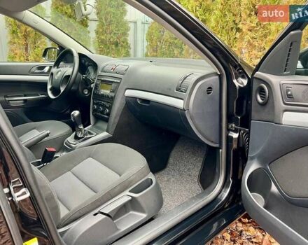 Черный Шкода Октавия, объемом двигателя 1.6 л и пробегом 198 тыс. км за 6700 $, фото 111 на Automoto.ua