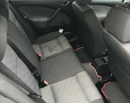 Черный Шкода Октавия, объемом двигателя 1.6 л и пробегом 245 тыс. км за 5900 $, фото 5 на Automoto.ua