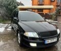 Черный Шкода Октавия, объемом двигателя 1.8 л и пробегом 214 тыс. км за 7500 $, фото 1 на Automoto.ua
