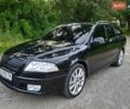 Черный Шкода Октавия, объемом двигателя 1.8 л и пробегом 264 тыс. км за 6500 $, фото 1 на Automoto.ua