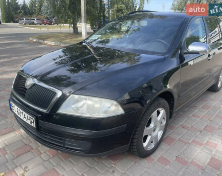 Черный Шкода Октавия, объемом двигателя 1.6 л и пробегом 247 тыс. км за 6000 $, фото 1 на Automoto.ua