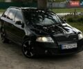 Черный Шкода Октавия, объемом двигателя 2 л и пробегом 235 тыс. км за 7999 $, фото 1 на Automoto.ua