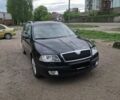 Черный Шкода Октавия, объемом двигателя 1.8 л и пробегом 183 тыс. км за 6900 $, фото 1 на Automoto.ua