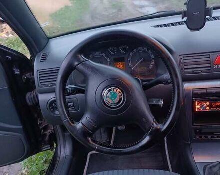 Черный Шкода Октавия, объемом двигателя 1.6 л и пробегом 193 тыс. км за 5700 $, фото 18 на Automoto.ua