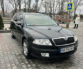 Черный Шкода Октавия, объемом двигателя 1.6 л и пробегом 242 тыс. км за 5500 $, фото 1 на Automoto.ua