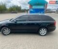 Черный Шкода Октавия, объемом двигателя 1.6 л и пробегом 251 тыс. км за 5800 $, фото 1 на Automoto.ua