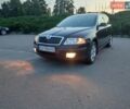 Чорний Шкода Октавія, об'ємом двигуна 1.8 л та пробігом 155 тис. км за 7699 $, фото 1 на Automoto.ua