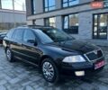 Черный Шкода Октавия, объемом двигателя 1.8 л и пробегом 207 тыс. км за 5900 $, фото 1 на Automoto.ua