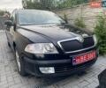 Черный Шкода Октавия, объемом двигателя 1.8 л и пробегом 126 тыс. км за 7700 $, фото 1 на Automoto.ua