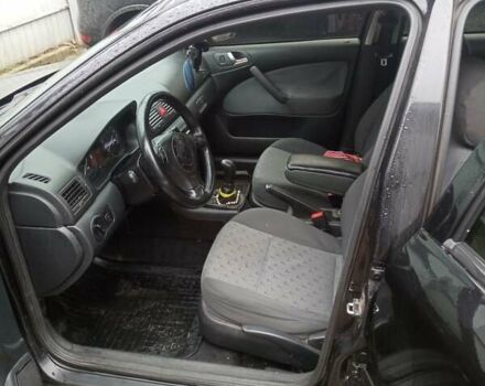 Чорний Шкода Октавія, об'ємом двигуна 1.9 л та пробігом 290 тис. км за 5999 $, фото 2 на Automoto.ua