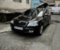 Черный Шкода Октавия, объемом двигателя 2 л и пробегом 278 тыс. км за 7700 $, фото 1 на Automoto.ua