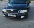 Черный Шкода Октавия, объемом двигателя 1.6 л и пробегом 268 тыс. км за 5500 $, фото 1 на Automoto.ua