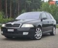 Черный Шкода Октавия, объемом двигателя 2 л и пробегом 245 тыс. км за 9199 $, фото 1 на Automoto.ua