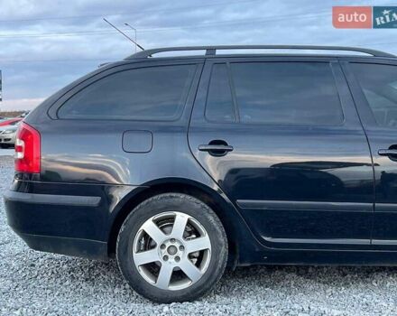 Черный Шкода Октавия, объемом двигателя 2 л и пробегом 307 тыс. км за 6990 $, фото 9 на Automoto.ua