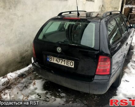 Черный Шкода Октавия, объемом двигателя 16 л и пробегом 245 тыс. км за 5000 $, фото 1 на Automoto.ua