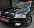 Черный Шкода Октавия, объемом двигателя 1.6 л и пробегом 202 тыс. км за 5799 $, фото 1 на Automoto.ua