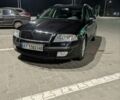 Черный Шкода Октавия, объемом двигателя 1.8 л и пробегом 233 тыс. км за 6500 $, фото 1 на Automoto.ua