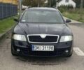 Чорний Шкода Октавія, об'ємом двигуна 2 л та пробігом 214 тис. км за 2100 $, фото 1 на Automoto.ua