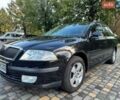 Черный Шкода Октавия, объемом двигателя 1.6 л и пробегом 199 тыс. км за 5599 $, фото 1 на Automoto.ua