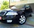 Черный Шкода Октавия, объемом двигателя 1.4 л и пробегом 197 тыс. км за 4999 $, фото 1 на Automoto.ua