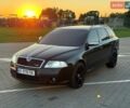 Чорний Шкода Октавія, об'ємом двигуна 2 л та пробігом 219 тис. км за 7450 $, фото 1 на Automoto.ua