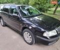 Черный Шкода Октавия, объемом двигателя 1.6 л и пробегом 240 тыс. км за 4500 $, фото 6 на Automoto.ua