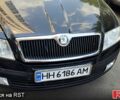 Черный Шкода Октавия, объемом двигателя 1.8 л и пробегом 208 тыс. км за 6500 $, фото 1 на Automoto.ua