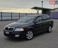 Черный Шкода Октавия, объемом двигателя 1.8 л и пробегом 202 тыс. км за 5750 $, фото 1 на Automoto.ua