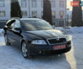 Чорний Шкода Октавія, об'ємом двигуна 1.6 л та пробігом 208 тис. км за 6950 $, фото 3 на Automoto.ua