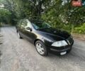 Черный Шкода Октавия, объемом двигателя 1.6 л и пробегом 240 тыс. км за 6500 $, фото 1 на Automoto.ua