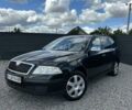 Черный Шкода Октавия, объемом двигателя 1.6 л и пробегом 225 тыс. км за 5450 $, фото 1 на Automoto.ua