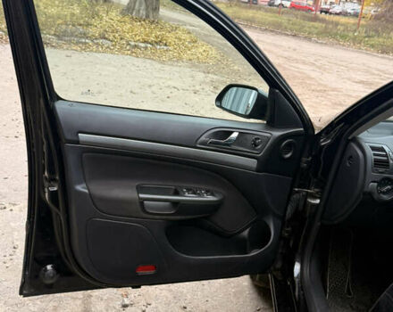 Черный Шкода Октавия, объемом двигателя 1.8 л и пробегом 197 тыс. км за 6500 $, фото 5 на Automoto.ua