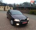 Чорний Шкода Октавія, об'ємом двигуна 1.6 л та пробігом 201 тис. км за 5800 $, фото 2 на Automoto.ua