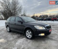 Черный Шкода Октавия, объемом двигателя 1.4 л и пробегом 208 тыс. км за 8450 $, фото 1 на Automoto.ua