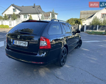 Чорний Шкода Октавія, об'ємом двигуна 1.6 л та пробігом 145 тис. км за 8599 $, фото 8 на Automoto.ua
