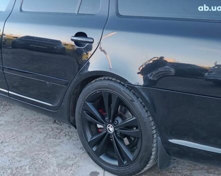 Черный Шкода Октавия, объемом двигателя 2 л и пробегом 252 тыс. км за 7990 $, фото 14 на Automoto.ua