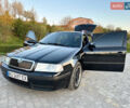 Черный Шкода Октавия, объемом двигателя 1.6 л и пробегом 200 тыс. км за 5800 $, фото 3 на Automoto.ua