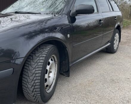 Черный Шкода Октавия, объемом двигателя 1.6 л и пробегом 201 тыс. км за 5650 $, фото 4 на Automoto.ua